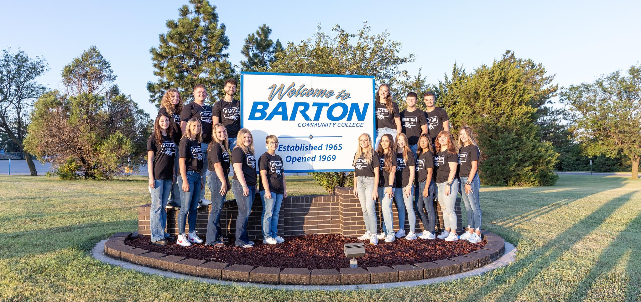 Student Ambassadors by the Barton Welcome Sign