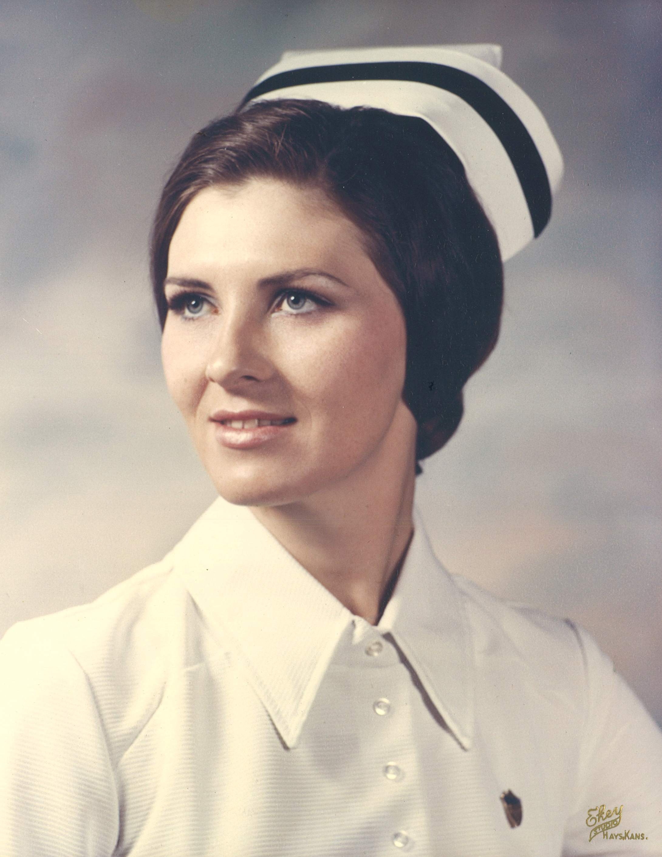 nurse in white formal attire for composite photo