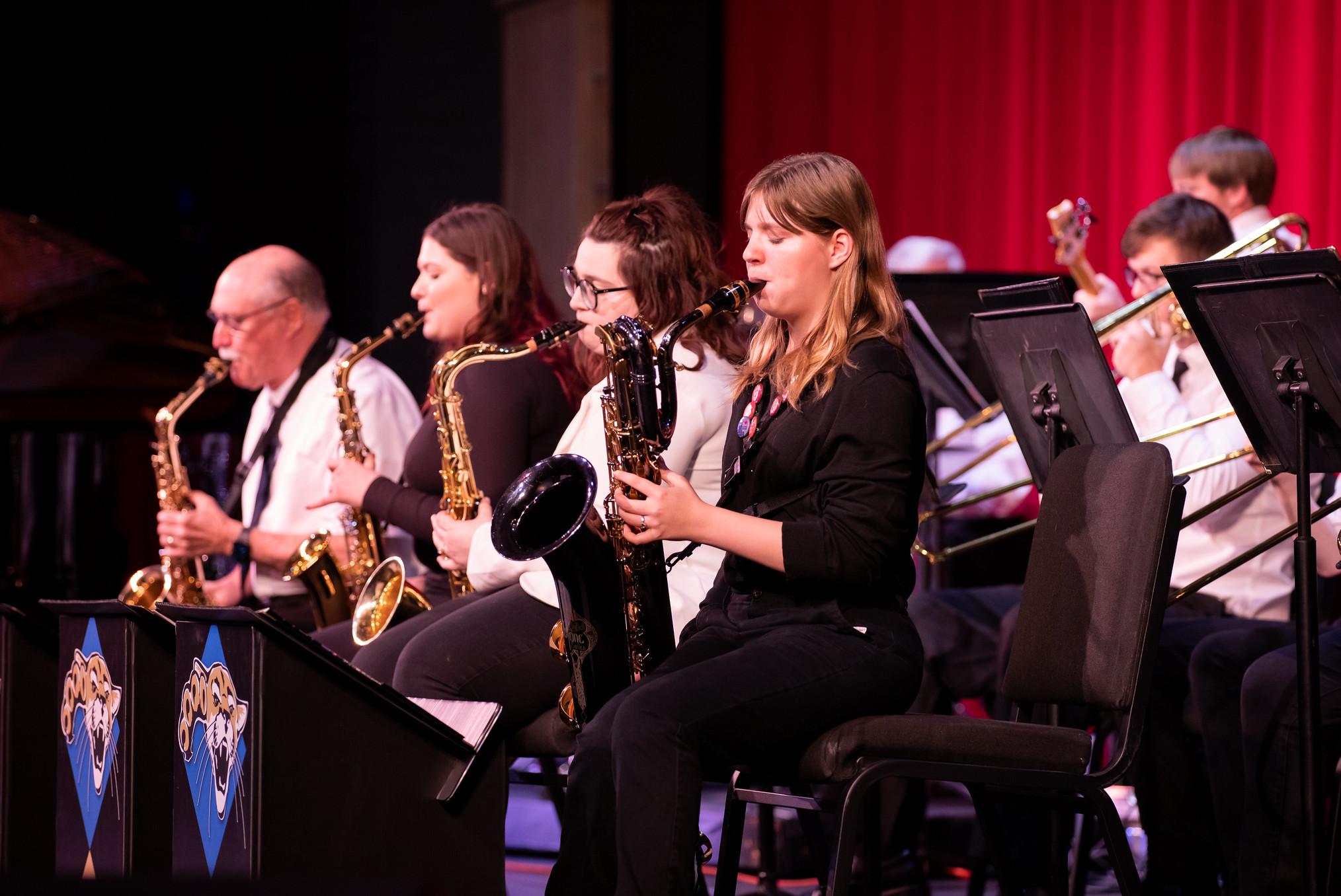 students playing instruments at a concert
